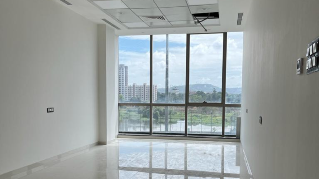 Lodha iThink Tower B Glass Facade with View of Palava City Football Ground